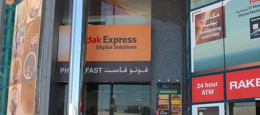 The Photo Fast storefront with its Kodak Express Digital Solutions sign